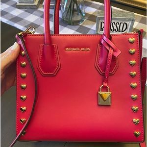 Michael Kors Mercer Pink leather handbag.